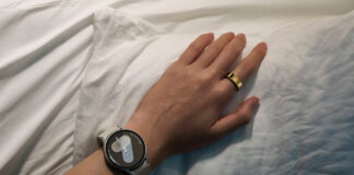 Person's hand wearing a Samsung Galaxy Watch and Galaxy Ring.